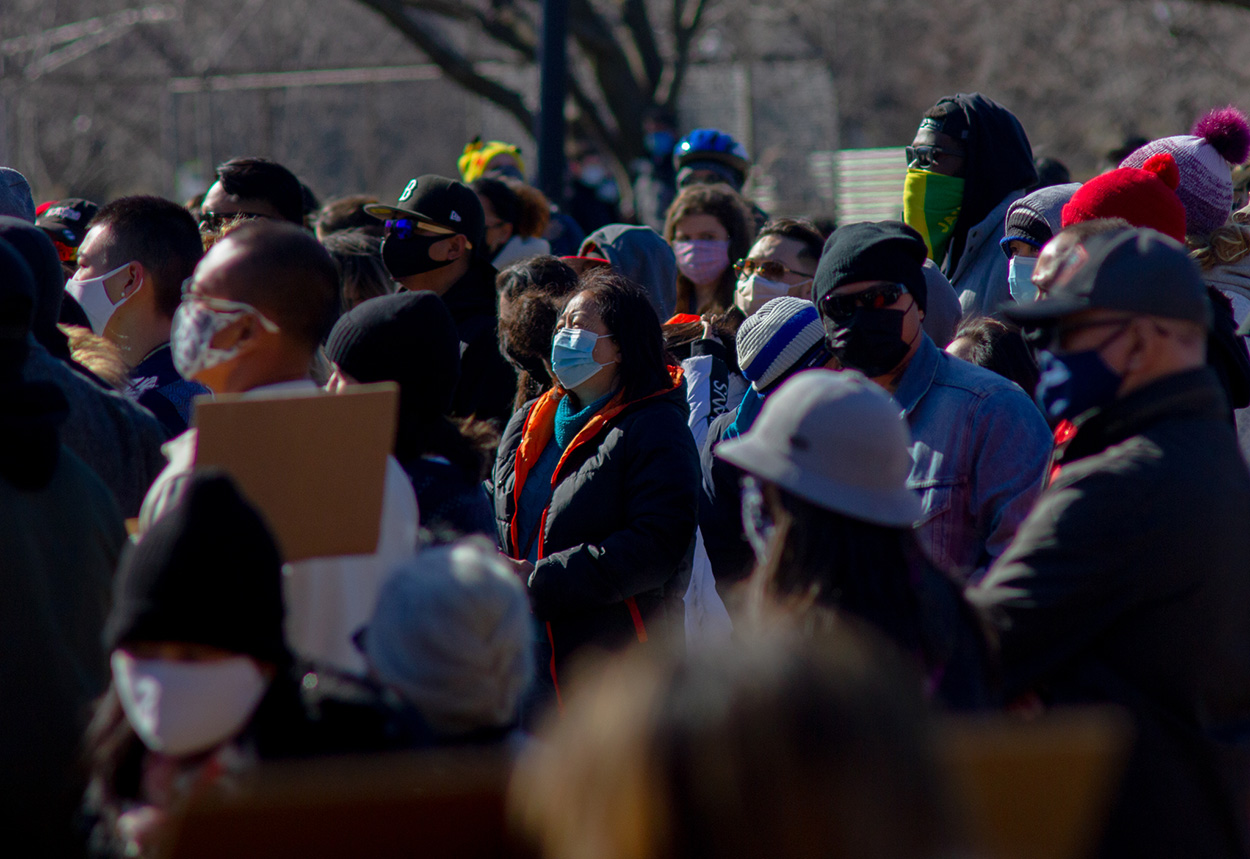 demonstrators at a stop asian hate protest in boston common