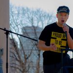 william lex ham speaks at a stop asian hate protest in boston common
