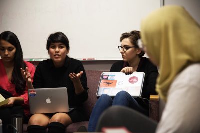 Boston University students Kimberly Barzola (left) and Marwa Sayed (right) discuss inclusivity at the BU Coalition of Student Activists meeting in the George Sherman Union Friday evening. PHOTO BY LAUREN PETERSON/ DAILY FREE PRESS STAFF