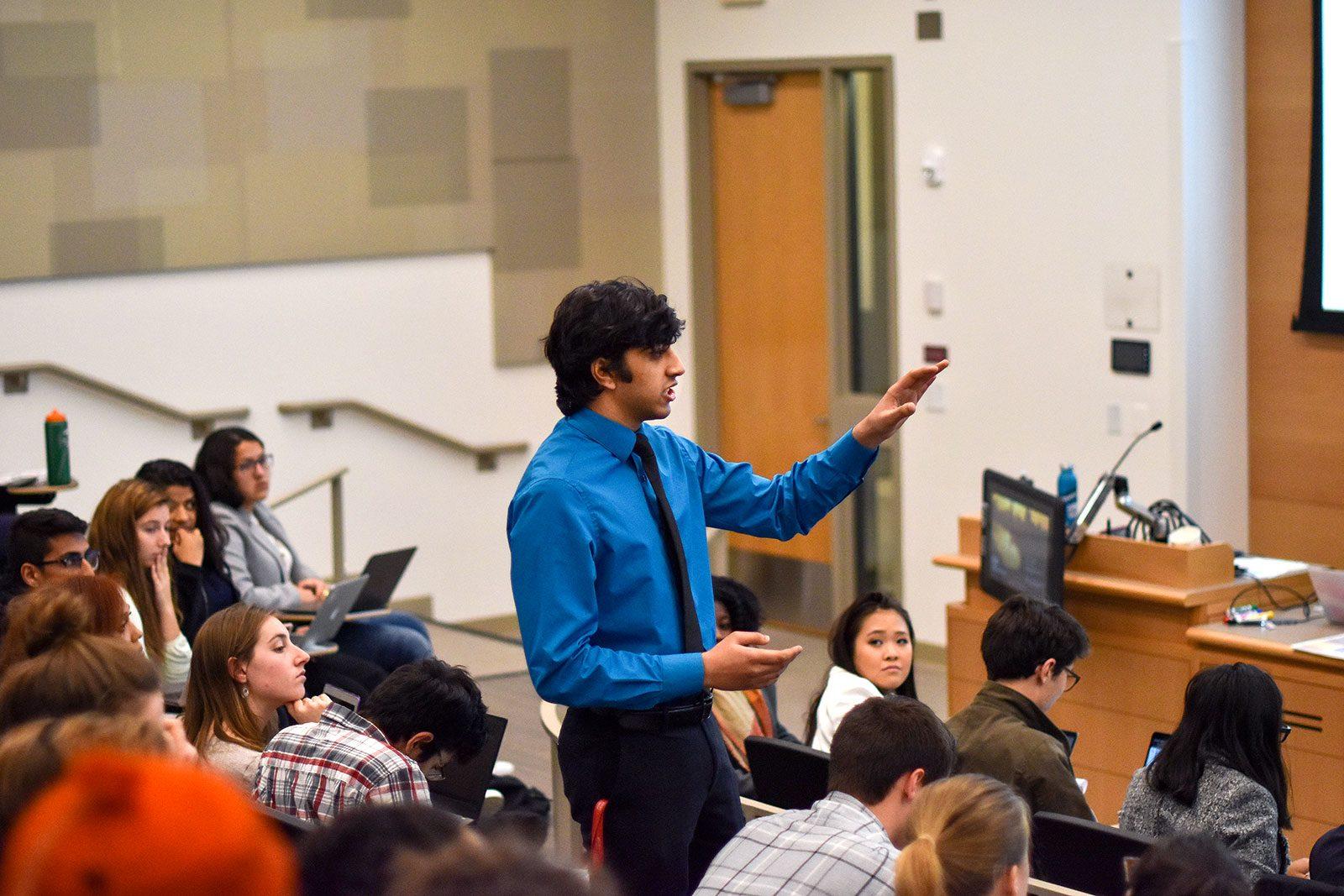Senator Aditya Jain (ENG ‘21) voices his opposition to the Undergraduate Student Government Executive Board’s statement regarding Ben Shapiro’s campus visit in the meeting on Monday night. LAURYN ALLEN/ DAILY FREE PRESS STAFF