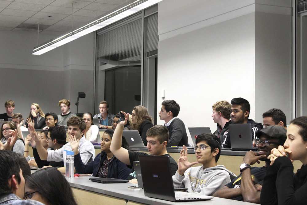 Students vote during a Student Government meeting. Student Government reserved roughly $15,000 of their budget for Cabinet events. PHOTO BY RACHEL SHARPLES/ DFP FILE PHOTO

