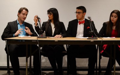 NewBU's VP candidate Petar Ojdrovic, a sophomore in the College of Engineering, speaks at the 2016 Student Government Election Slate Debate on Thursday. He sits alongside Presidential candidate and ENG sophomore Nadia Asif; VP of Finance candidate Atid Malka, a freshman in the College of Arts and Sciences; and VP of IA candidate Rachel Feigelson, a sophomore in the College of General Studies. PHOTO BY SAVANAH MACDONALD/DAILY FREE PRESS STAFF 