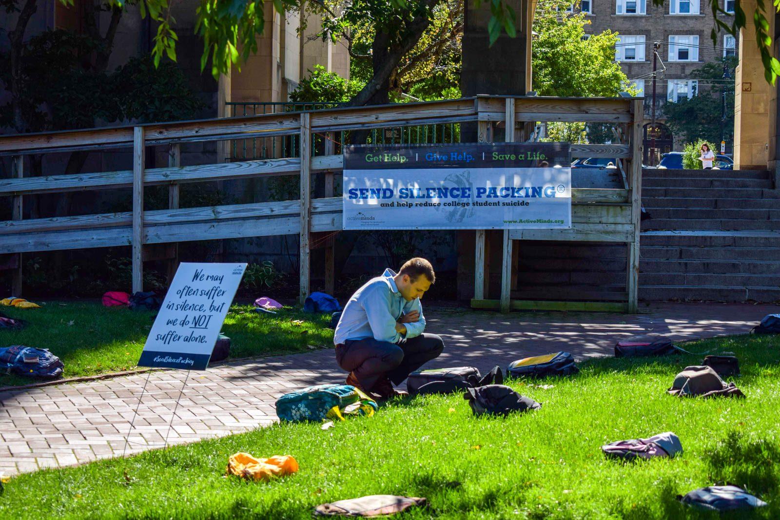 A student attends a college suicide awareness event organized by Active Minds at Boston University in September 2017. A team of BU students will take part in the American Foundation for Suicide Prevention Out of the Darkness Walk Saturday. LILIAN LI/ DFP FILE PHOTO