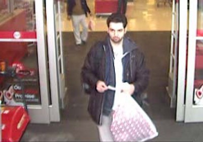 An image presented as evidence Wednesday in the trial of Boston Marathon bombing suspect Dzhokhar Tsarnaev shows Tamerlan Tsarnaev leaving a Target after purchasing the backpacks later used to carry the explosives. PHOTO FROM BOSTONDEFENDER.ORG
