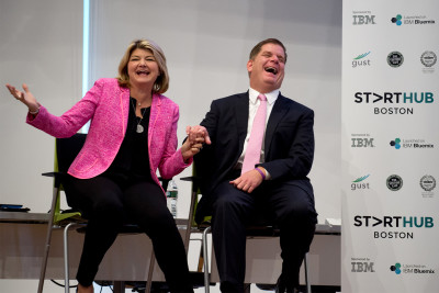 Boston Mayor Martin Walsh, seated next to IBM Executive Sandy Carter, announced the launch of Boston's StartHub at the Bruce C. Bolling Municipal Building in Roxbury Tuesday afternoon. PHOTO BY MADELINE MALHOTRA/DAILY FREE PRESS STAFF
