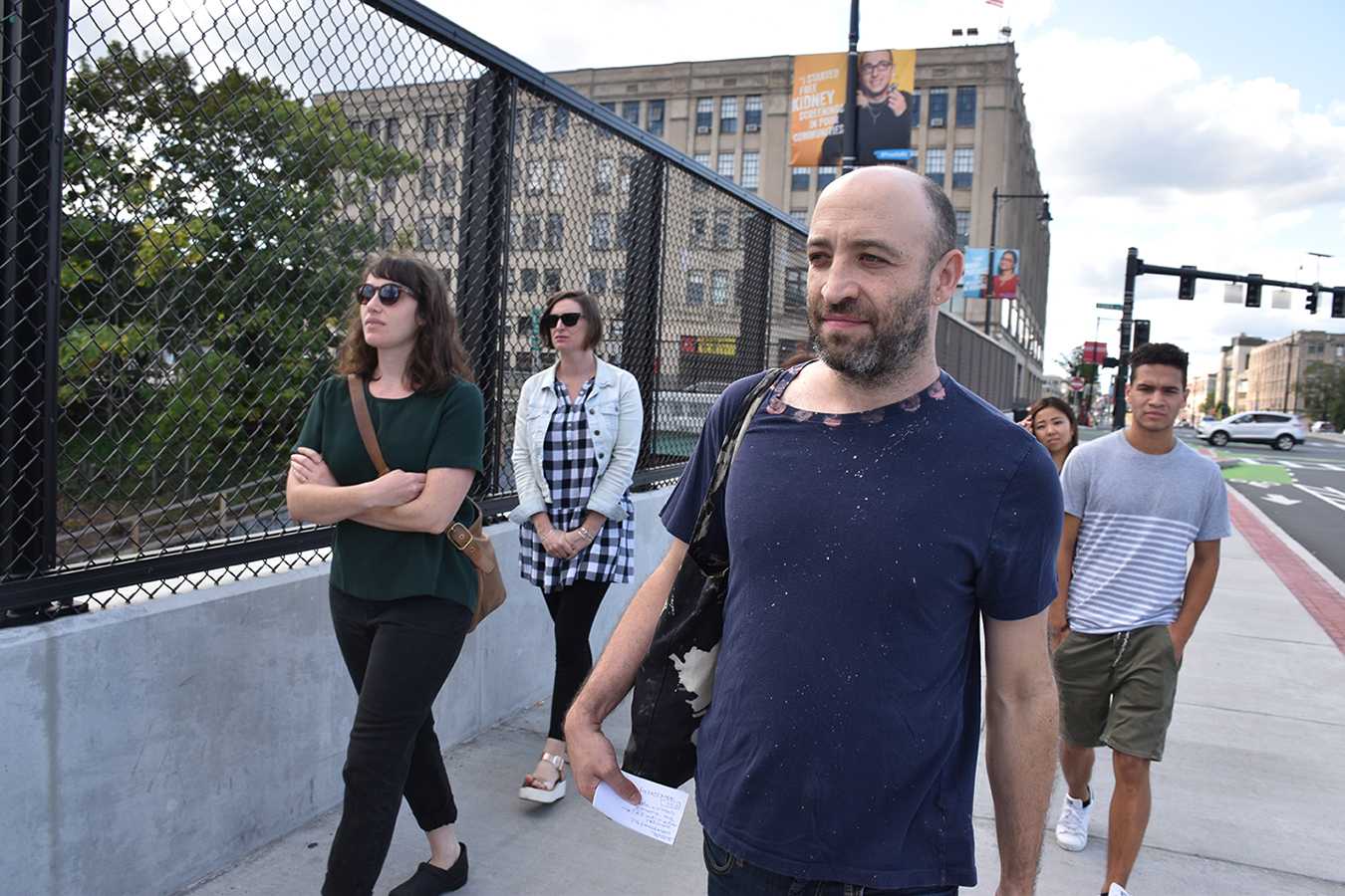 Boston University alum Todd Shalom leads participants through a walk on campus Saturday. ZOE ADES/ DAILY FREE PRESS STAFF