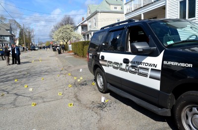A photograph submitted as evidence shows damage left behind in Watertown, where Boston Marathon bombing suspect Dzhokhar Tsarnaev was later found by police. Experts gave testimony Tuesday at the John Joseph Moakley United States Courthouse about the Watertown shootout. PHOTO COURTESY OF THE FBI
