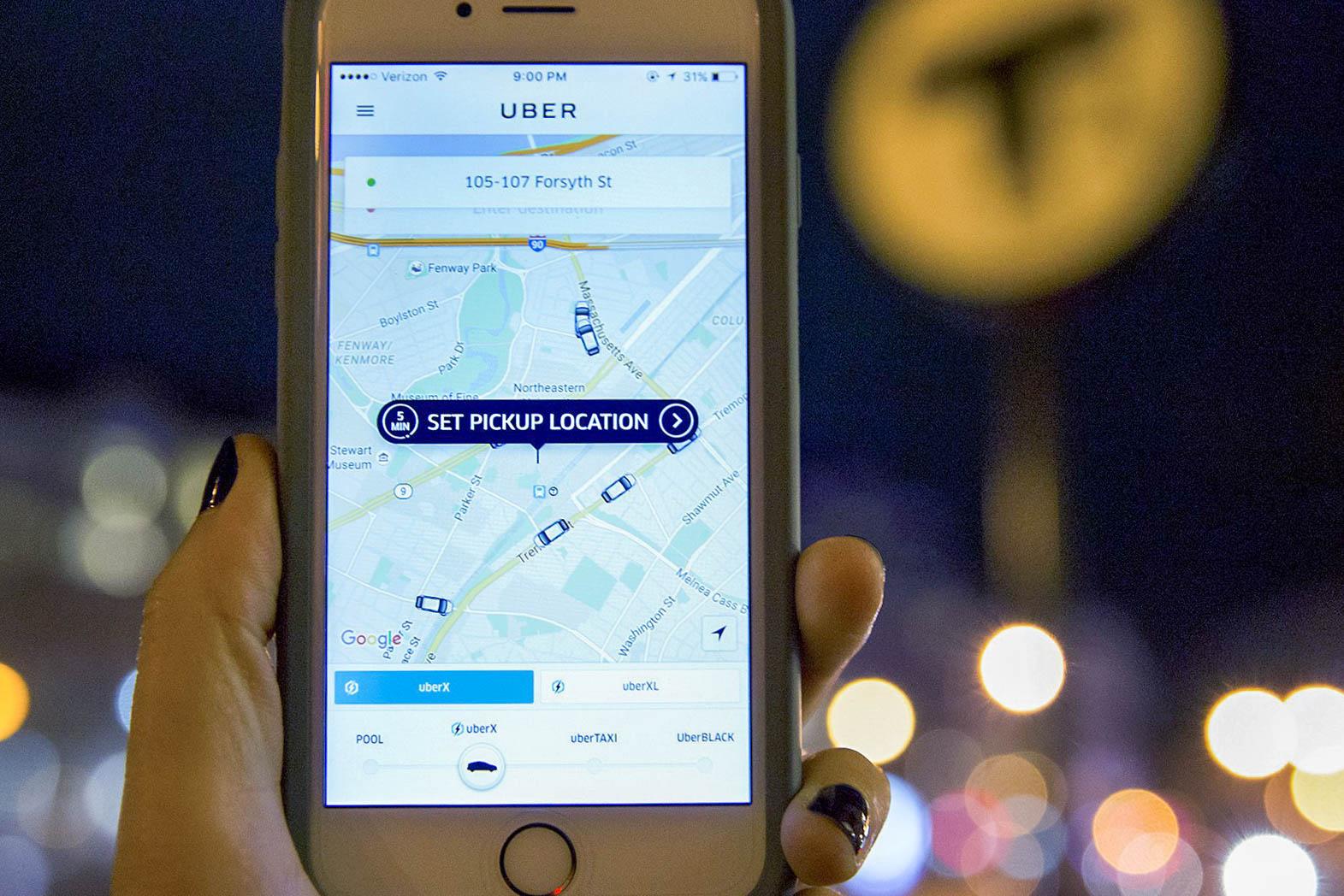 Massport is changing the drop-off locations for ride-hailing services Uber and Lyft at Logan Airport. SARAH SILBERGER/ DFP FILE

