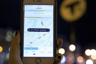 In response the Massachusetts Bay Transportation Authority cutting Late-Night Service, the ride sharing app Uber will offer a fixed $5 price for riders between 12:30 a.m. and 2 a.m. on Friday and Saturday nights to compensate for the inconvenience. PHOTO BY SARAH SILBIGER/DAILY FREE PRESS STAFF