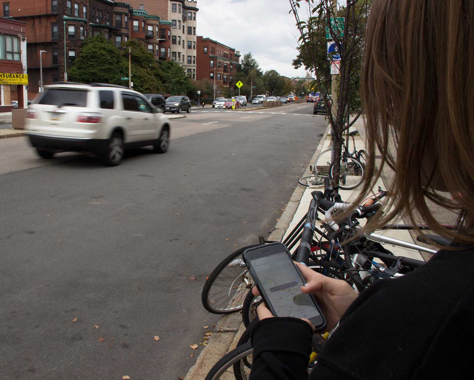 The ride-sharing app Uber reached 2 million total rides in Massachusetts last month. PHOTO ILLUSTRATION BY MARY SCHLICHTE/DAILY FREE PRESS STAFF