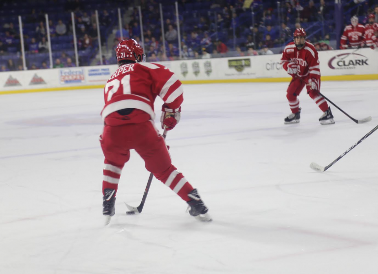Senior forward Patrick Harper, shown in an Oct. 25 game against UMass Lowell, was named the Hockey East Player of December and scored his 100th career point against Brown University. Harper's assist helped the Terriers win the game against the Bears on Dec. 8.
