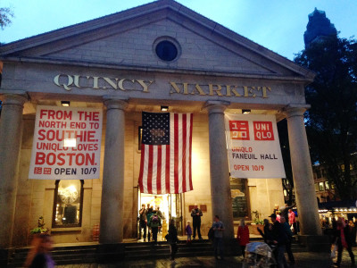 Uniqlo Faneuil Hall advertises its Friday opening on Quincy Market. PHOTO BY MARIAM SYED/DAILY FREE PRESS STAFF