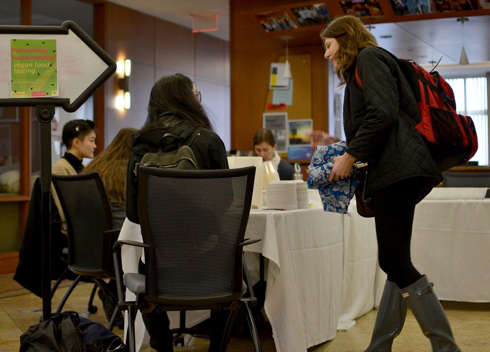Students arrive for the Boston University Global Environmental Brigades’ vegan tasting food tasting event Friday at the Hillel House. PHOTO BY CHLOE GRINBERG/ DAILY FREE PRESS STAF