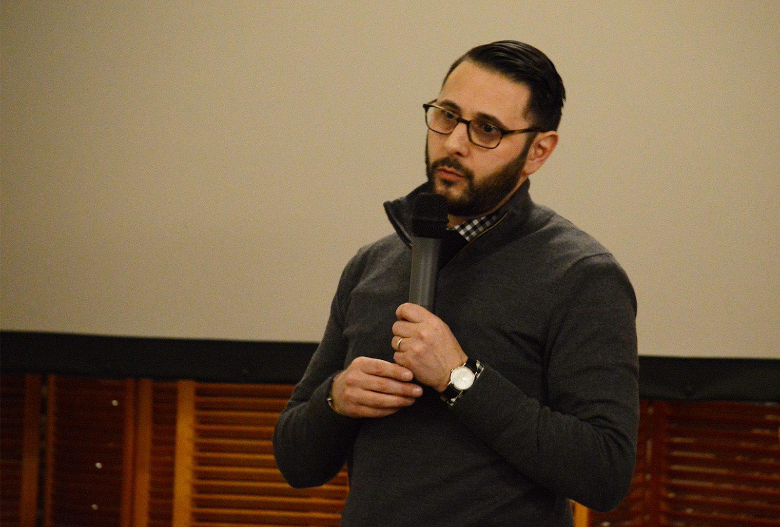 Dr. Vincent Intondi speaks Thursday night at the Boston Public Library about the cross between the United States nuclear weapons policy and the fight for racial equality. PHOTO BY VIGUNTHAAN THARMARAJAH/ DAILY FREE PRESS STAFF