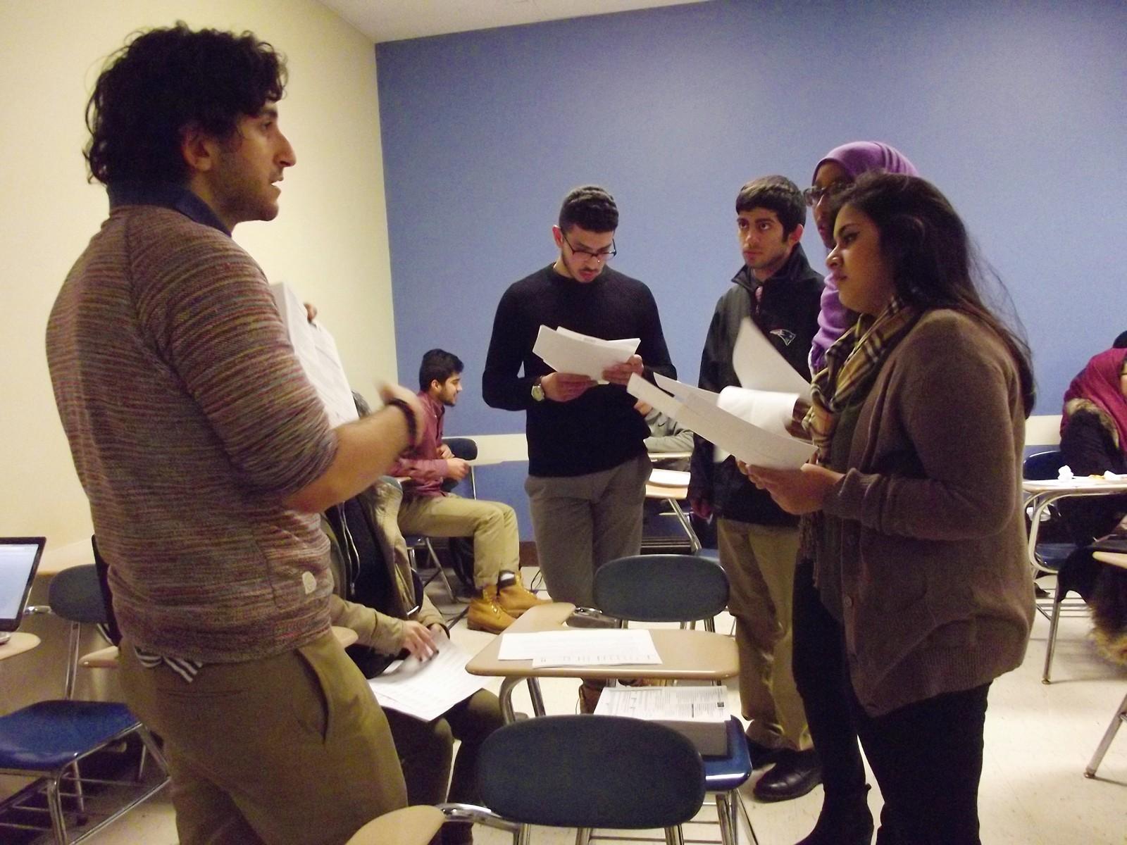 BU students call Muslim Boston-area residents to register them to vote at an event held by the Islamic Society of Boston University, MassMuslims and JetPac Inc. Thursday night in the College of Arts and Sciences. PHOTO BY ADRIANA DIAZ/DAILY FREE PRESS CONTRIBUTOR