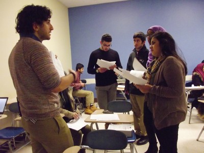 BU students call Muslim Boston-area residents to register them to vote at an event held by the Islamic Society of Boston University, MassMuslims and JetPac Inc. Thursday night in the College of Arts and Sciences. PHOTO BY ADRIANA DIAZ/DAILY FREE PRESS CONTRIBUTOR 