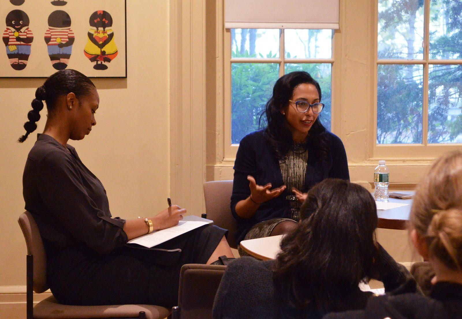Leah Rigueur, professor of public policy at the John F. Kennedy School of Government, speaks about black voters and the peculiarities of the 2016 election during a talk at the African American Studies Program Building Tuesday evening. PHOTO BY CAROLYN KOMATSOULIS/ DAILY FREE PRESS STAFF