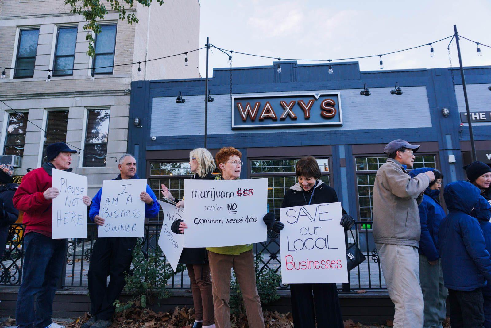Brookline residents rally against a proposed conversion of the former Waxy’s Modern Irish Bar location into the nation’s largest retail marijuana store. SOPHIE PARK/ DAILY FREE PRESS STAFF