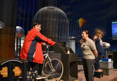 Melanie Parker, a research scientist, leads a demonstration about electricity during the inaugural Women and Girls in STEM event Saturday at the Museum of Science. PHOTO BY CHLOE GRINBERG/ DAILY FREE PRESS STAFF 