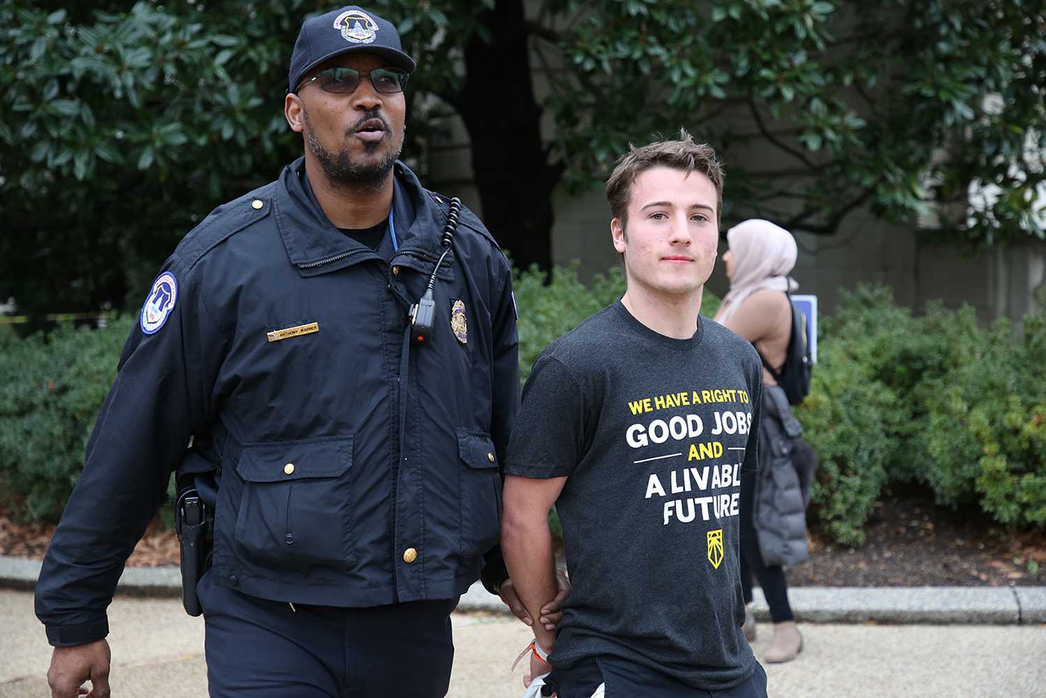 Boston University sophomore Owen Woodcock in a climate protest in Washington, D.C., last month. COURTESY OF THE SUNRISE MOVEMENT