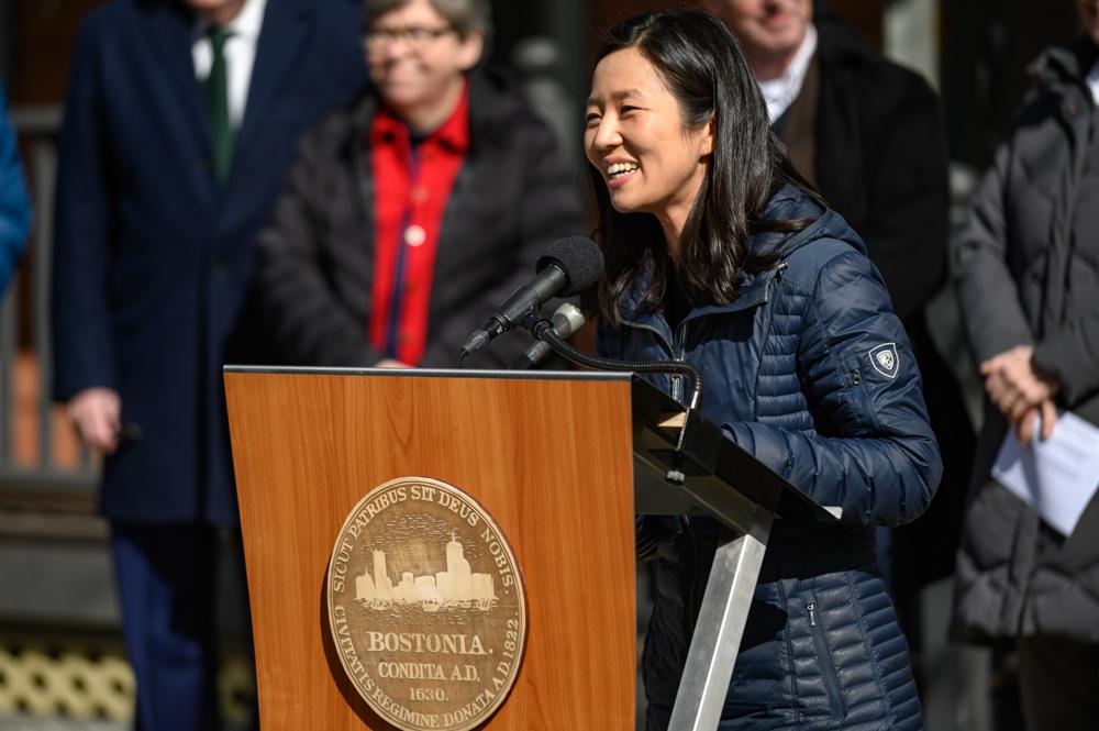 Boston mayor Michelle Wu speaks at a Green New Deal announcement in Allston on March 16. Wu announced a program to decarbonize and electrify Boston’s smaller buildings in a press release on Sept. 21. ANDREW BURKE-STEVENSON/DFP FILE
