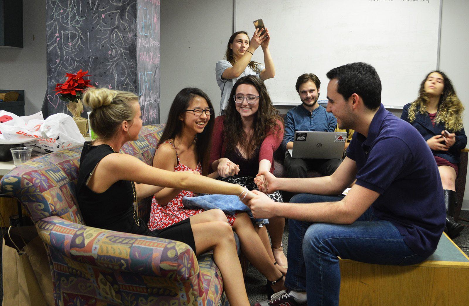 Boston University's Student Election Commission announces the results of the Student Government Executive Board elections Tuesday night in the basement of the George Sherman Union. PHOTO BY CAROLYN KOMATSOULIS/ DAILY FREE PRESS STAFF 