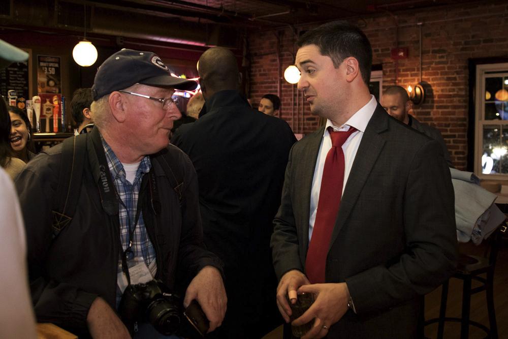 Boston District 8 City Councilor Josh Zakim speaks to a constituent in November 2017. Zakim, along with District 2 Councilor Ed Flynn, filed a hearing order to have the Council debate whether or not to move Hempfest away from the Boston Common. JOHN KAVOURIS/ DFP FILE PHOTO