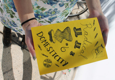 Emma Karin Eriksson holds her latest edition of her zine, "Radical Domesticity," after the Household Cleaners Workshop at the Boston Zine Fest Saturday. PHOTO BY MADISON GOLDMAN/DAILY FREE PRESS CONTRIBUTOR